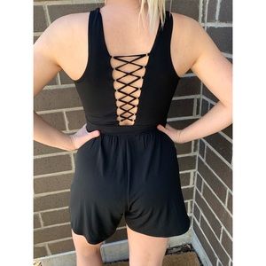 Cage-back little black romper